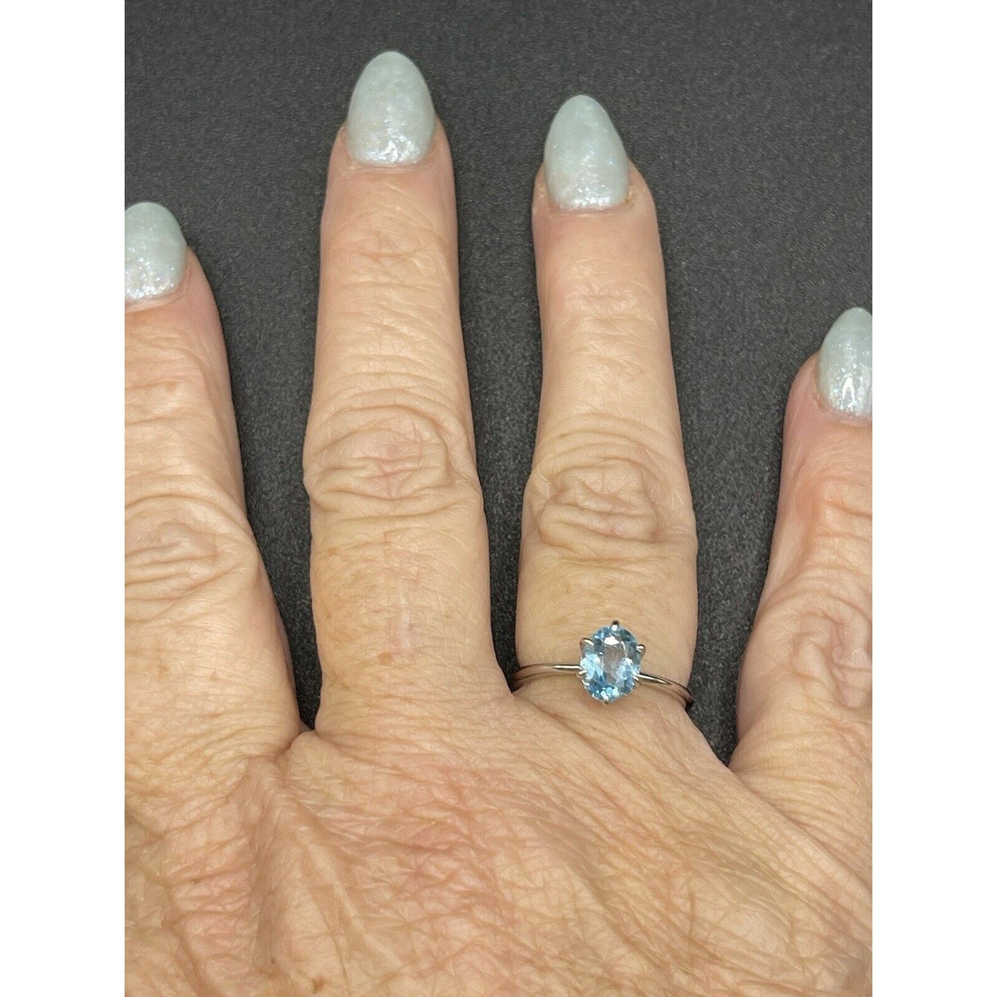 New Condition Sterling Silver Genuine Blue Topaz 8x6MM Size 7.00