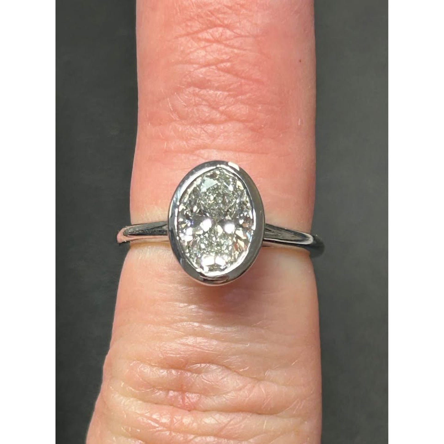 14k White Gold Lab Grown Oval 2.05 Carat Diamond E Color VS1 Bezel Ring