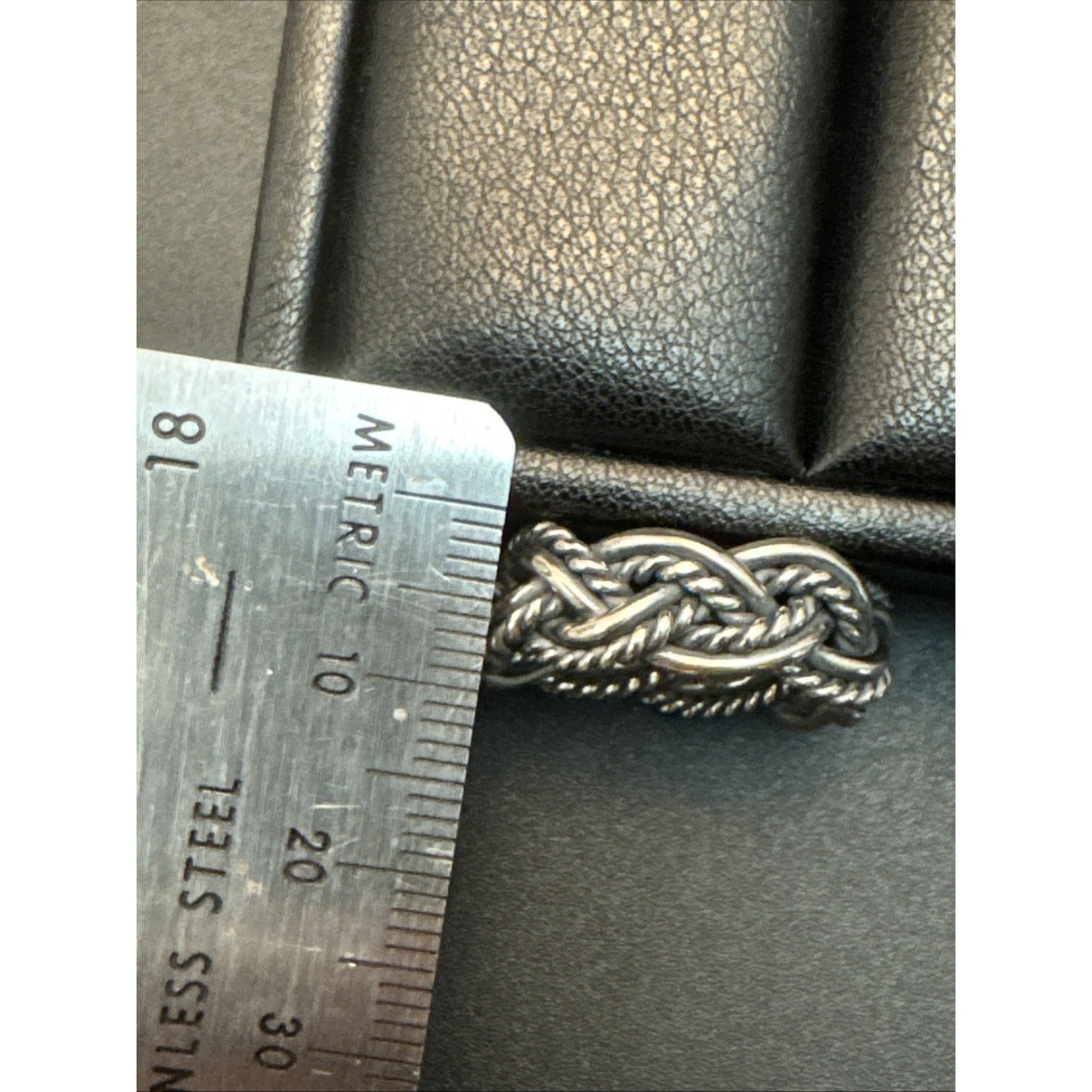 New condition sterling silver weave band ring size 9. 75