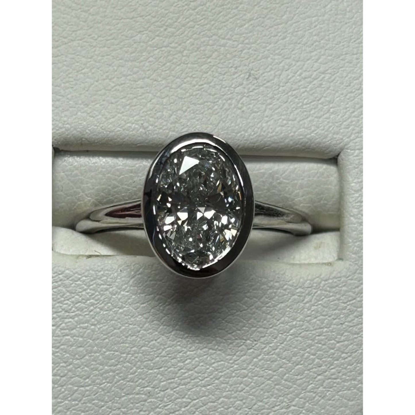 14k White Gold Lab Grown Oval 2.05 Carat Diamond E Color VS1 Bezel Ring