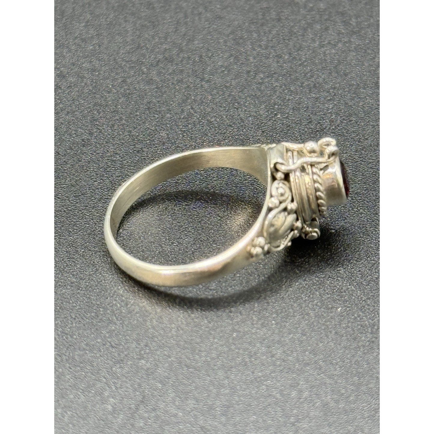New Condition Sterling Silver Garnet Poison Ring Size 7.00